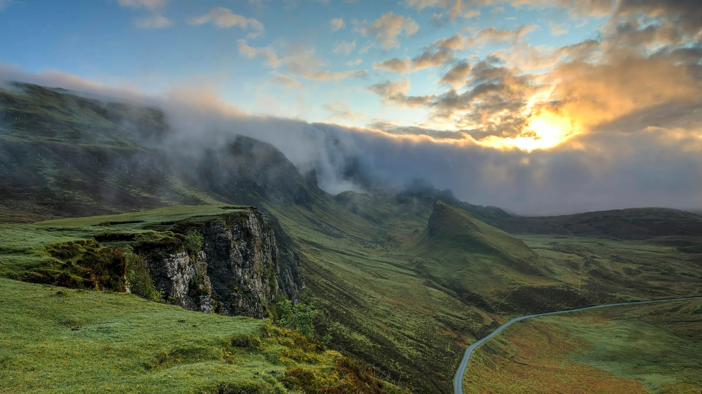 A wide, atmospheric landscape at dawn — a signature frame from Scott Clayton's portfolio.