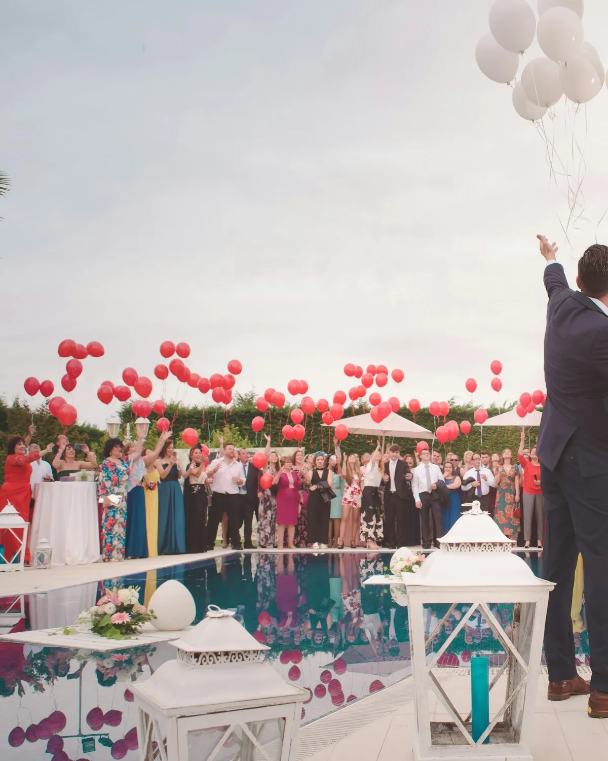 A couple sharing a private moment away from their guests.